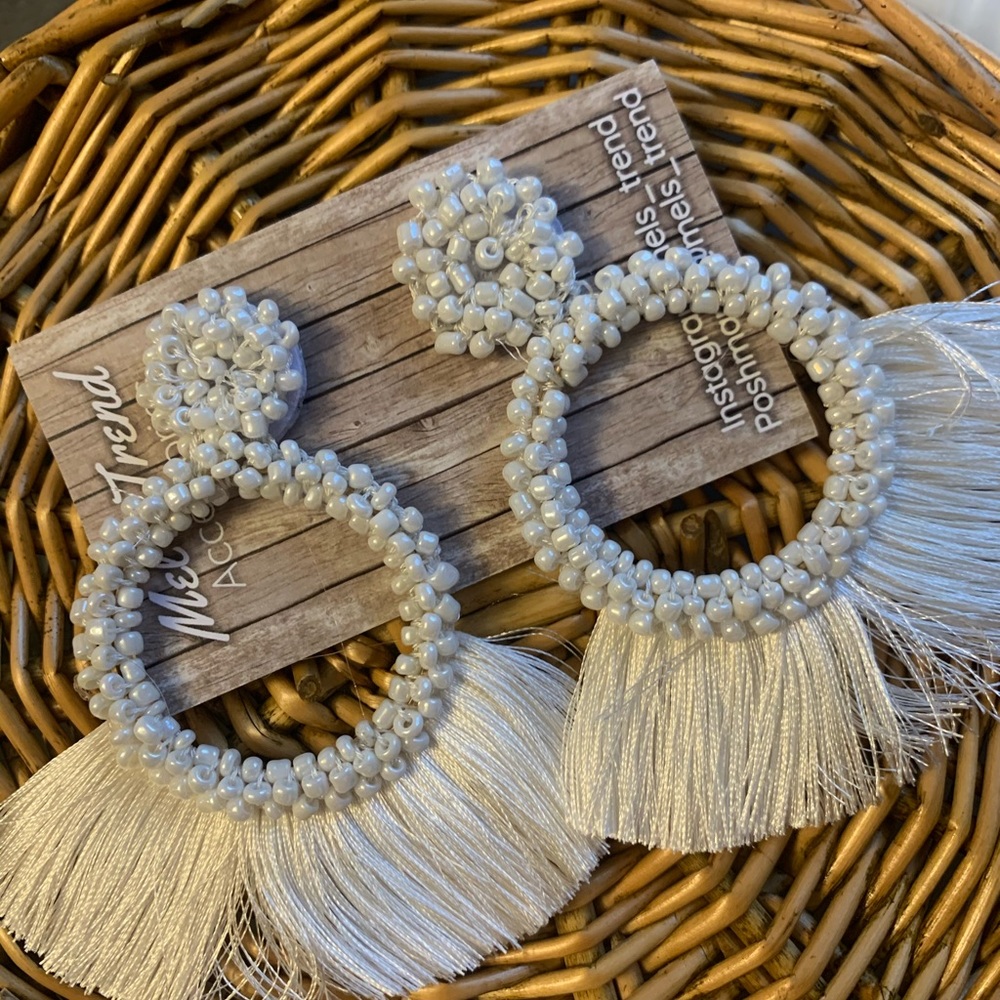 White tassel earrings